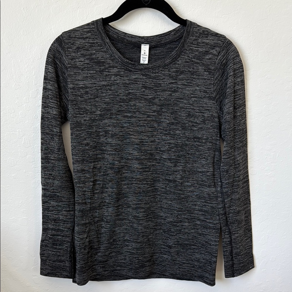 Lululemon swiftly long sleeve in dark gray/black. Size 4, never worn